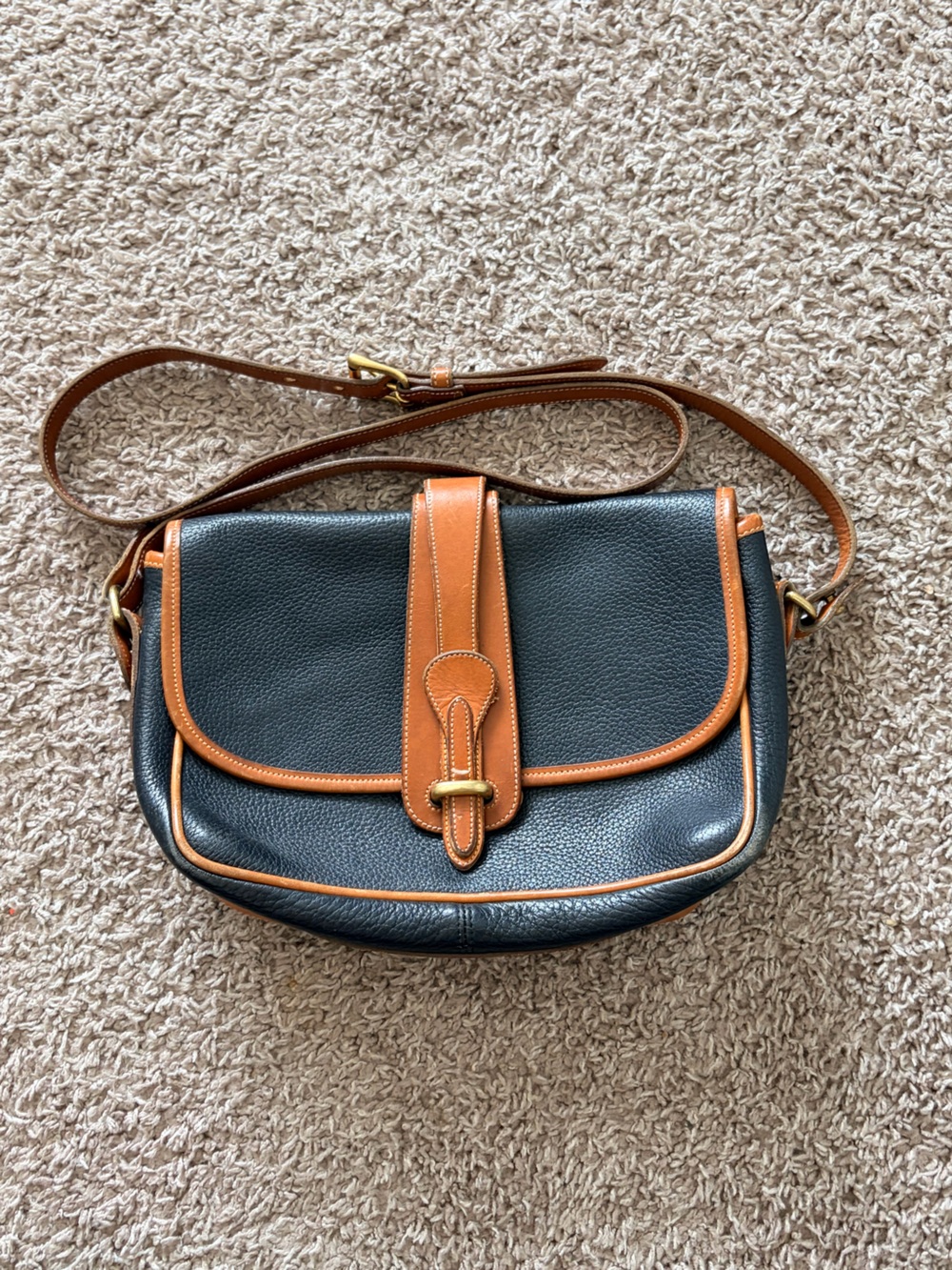 Dooney & Bourke Black Pebbled Leather Crossbody with Brown Trim